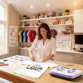White women use H10 Portable Heat Press to make personalized T-shirts in the workshop.