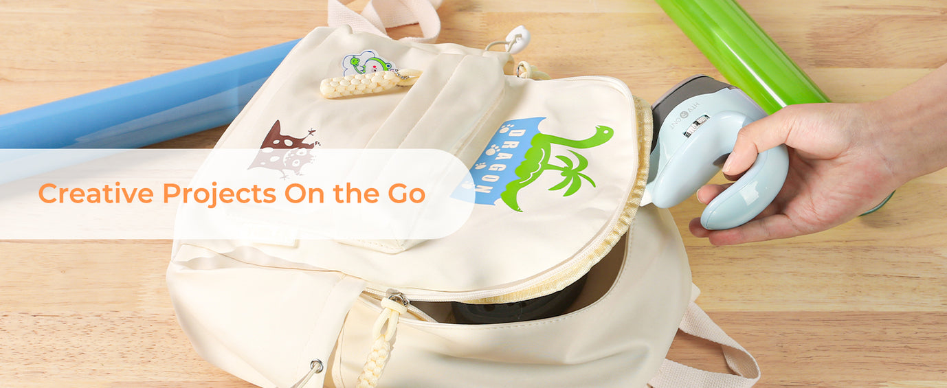 Canvas bag with tools and a hand holding a tool on a wooden surface, with text 'Creative Projects On the Go'.