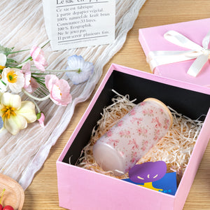 Glass with pink knot pattern