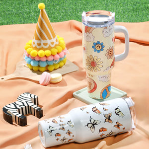 2 Handle Tumblers with butterfly patterns