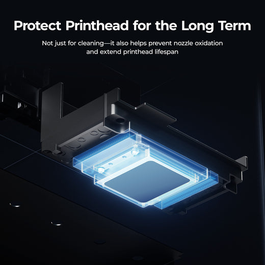 Print head with protective cover on a dark background, highlighting the importance of protecting the printhead.
