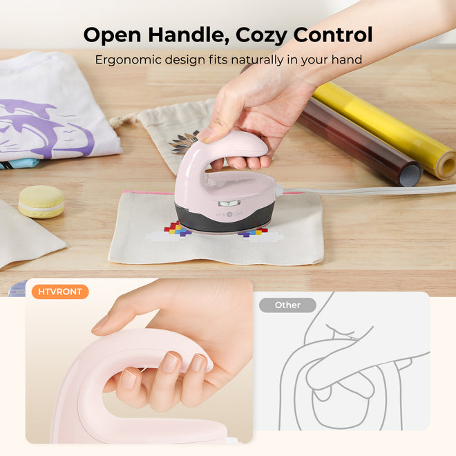 Handheld iron with ergonomic design on a wooden surface, emphasizing comfort and control.