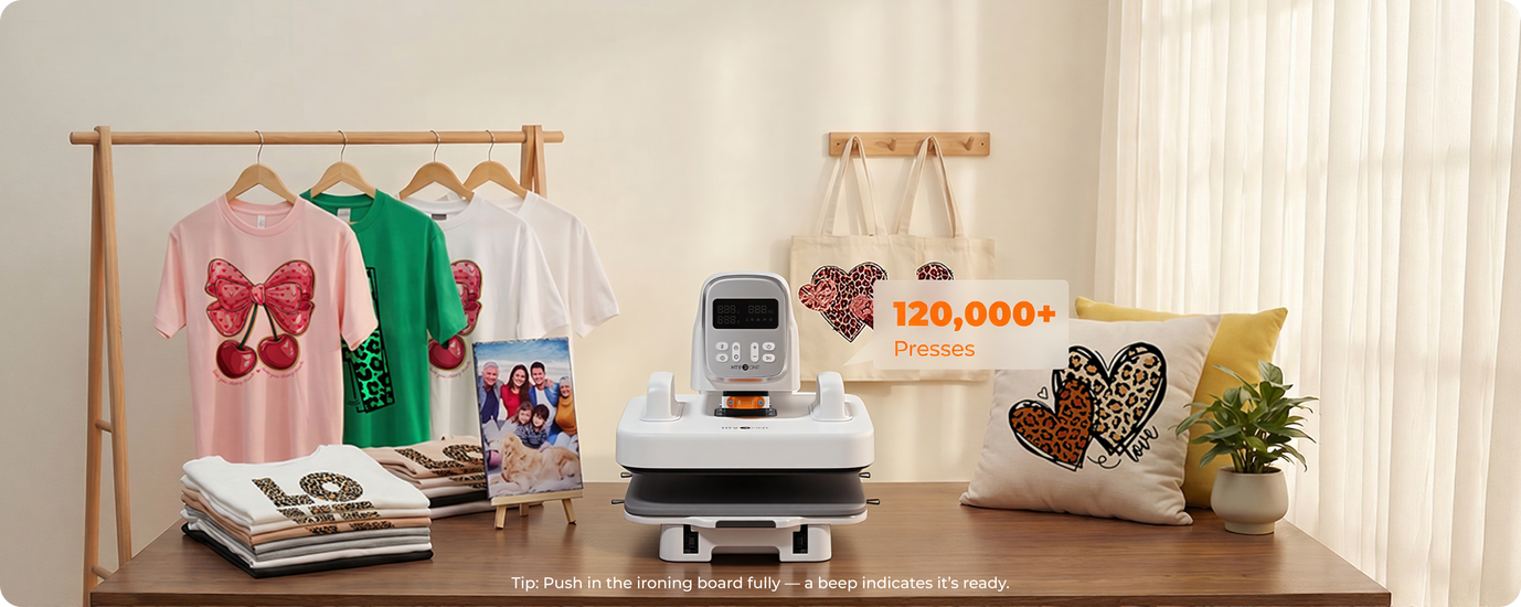 An ironing board with clothes, a photo frame, and A100 multi-heat press items on a wooden table.